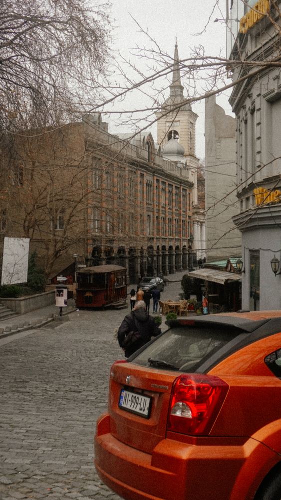 A street with parked cars